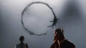 The very first shot of the movie shows a circular architectural design, foreshadowing the non-linear alien language. in Arrival