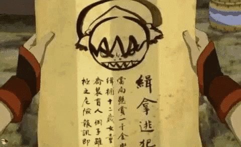 Toph holds up a Fire Nation wanted poster, but she is holding the paper completely upside down. in Avatar: The Last Airbender