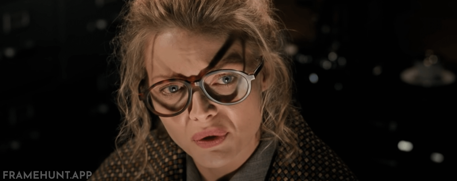 The shadow cast by Selina Kyle's eyeglasses perfectly forms the shape of the Catwoman mask on her face. in Batman Returns