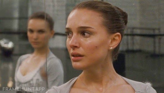 Nina's reflection in the ballet studio mirror moves a fraction of a second later than her actual body. in Black Swan