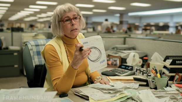Waymond's receipt on the tax desk has black ink circles drawn on it, resembling the everything bagel and googly eyes. in Everything Everywhere All at Once