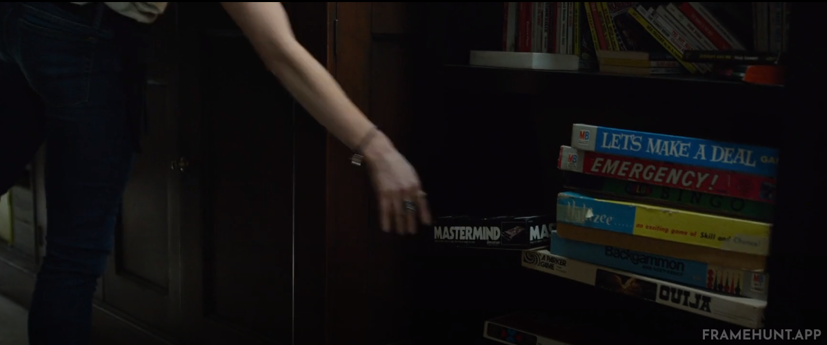 A copy of the classic board game 'Mastermind' is prominently placed on Amy and Nick's coffee table. in Gone Girl