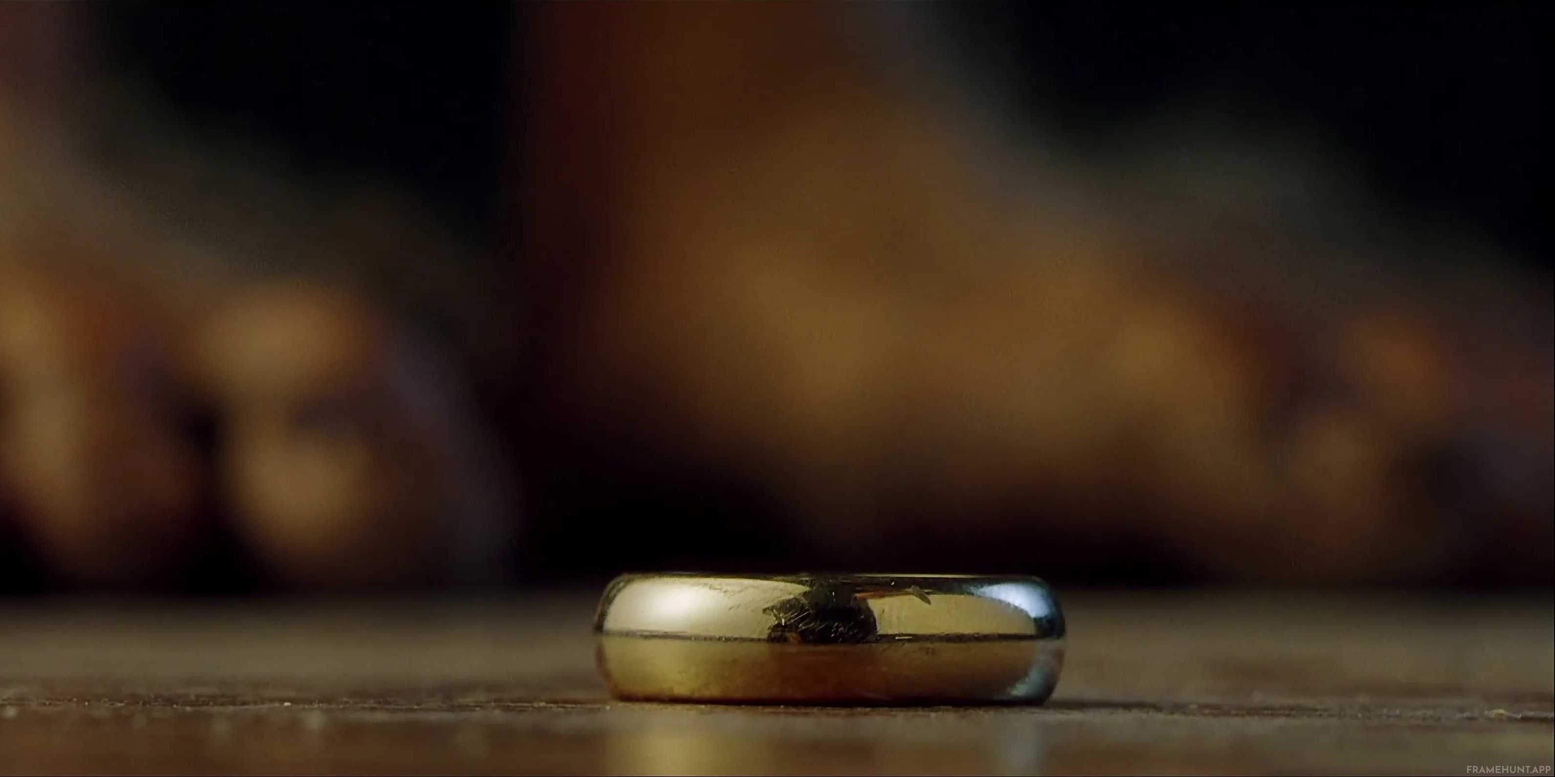 When Bilbo Baggins drops the One Ring onto the floor of Bag End, it drops completely flat without a single bounce. in The Lord of the Rings: The Fellowship of the Ring
