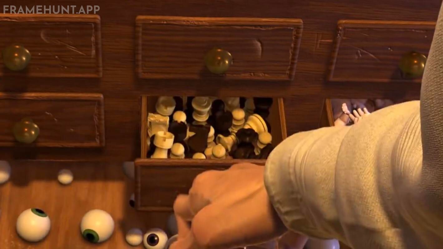 The old man who restores Woody is Geri from the short film Geri's Game, and his chess pieces are hidden in his toolbox. in Toy Story 2