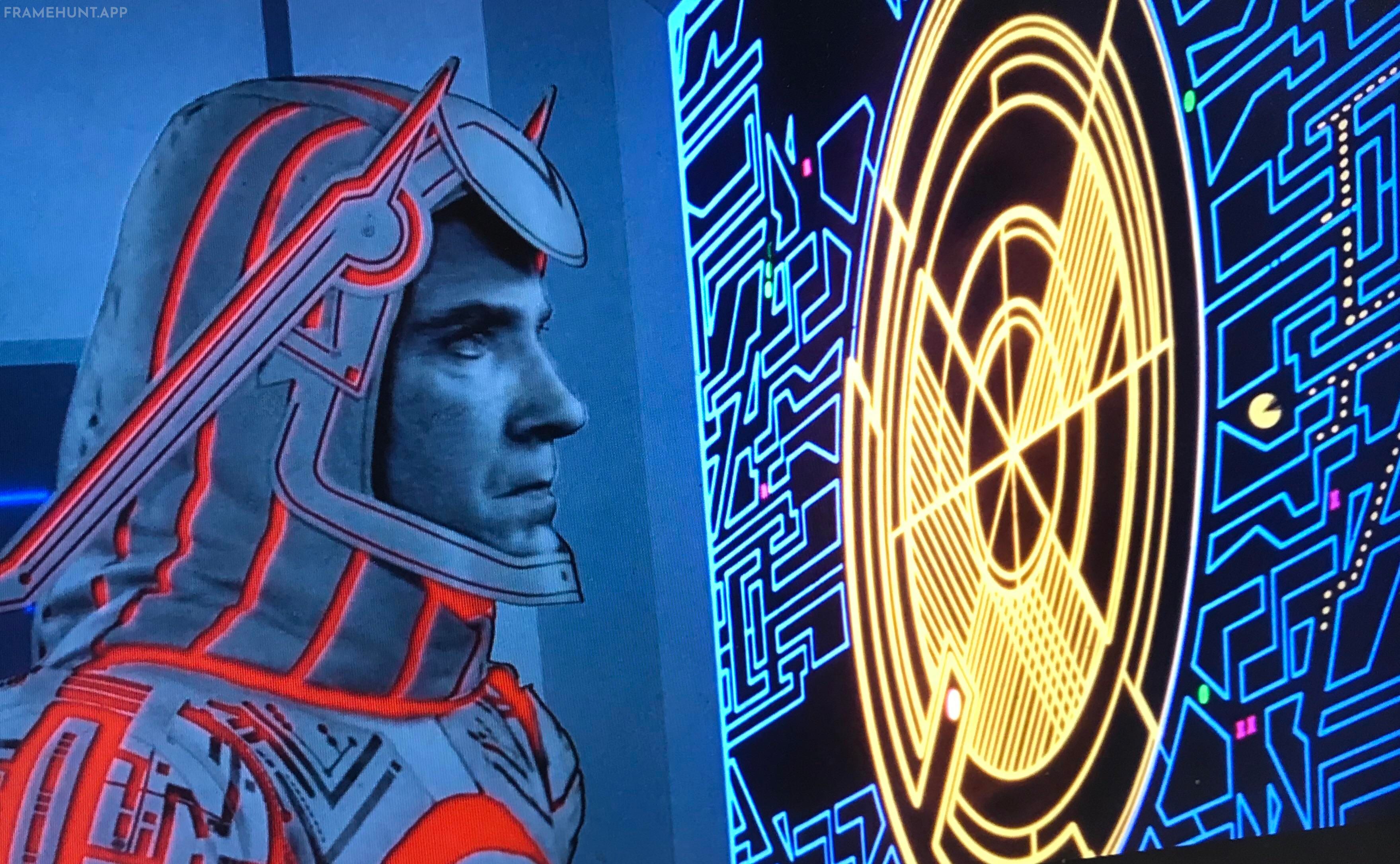 A distinct, animated Pac-Man figure can be seen chomping dots on Sark's tactical command screen. in Tron
