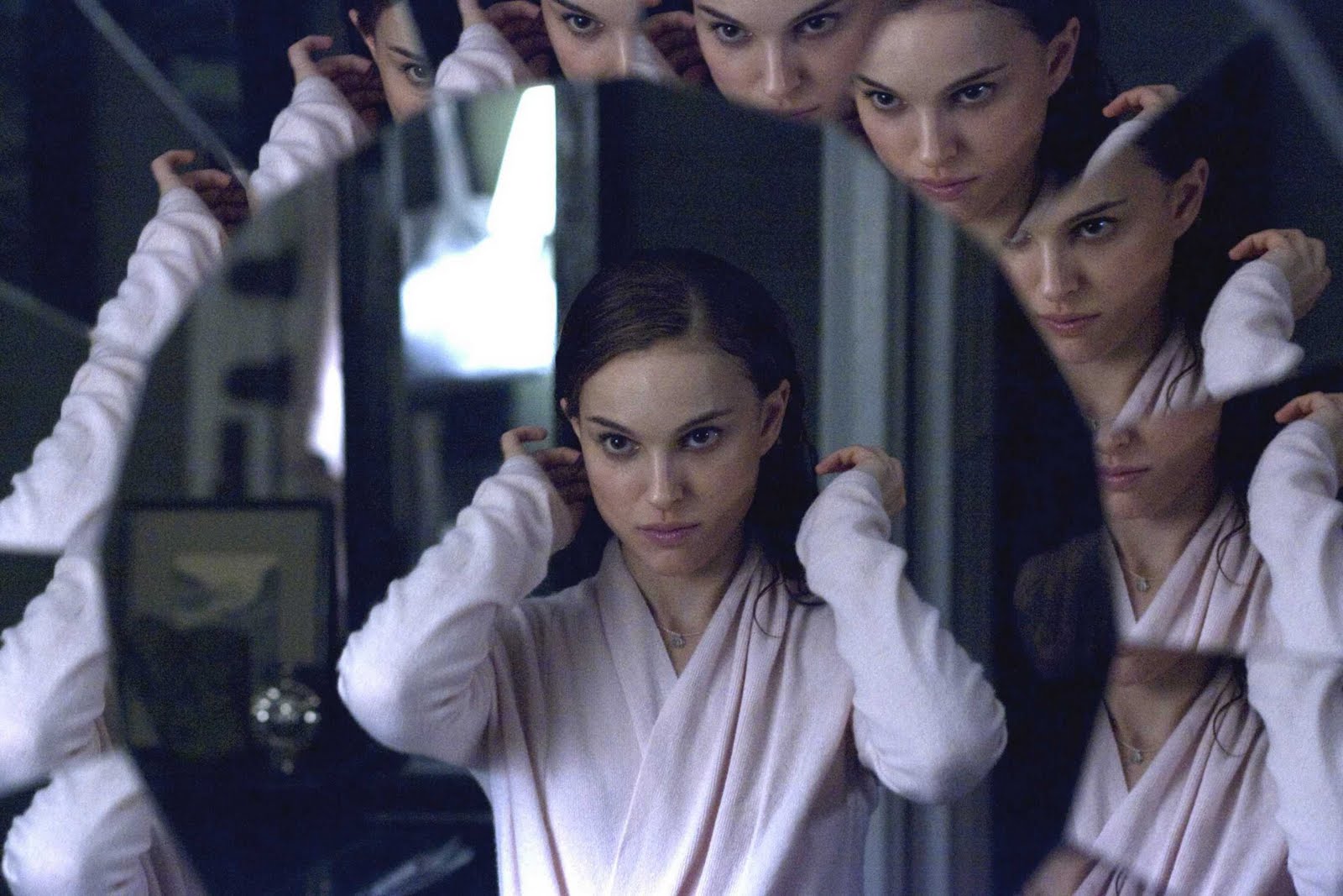 The reflections in the mirrors often move independently or lag behind the main character's actual movements in Black Swan