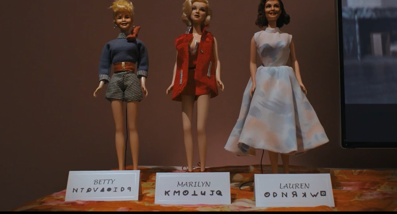 Coded messages are hidden in the billboards and background music that point to a real-world mystery in Under the Silver Lake