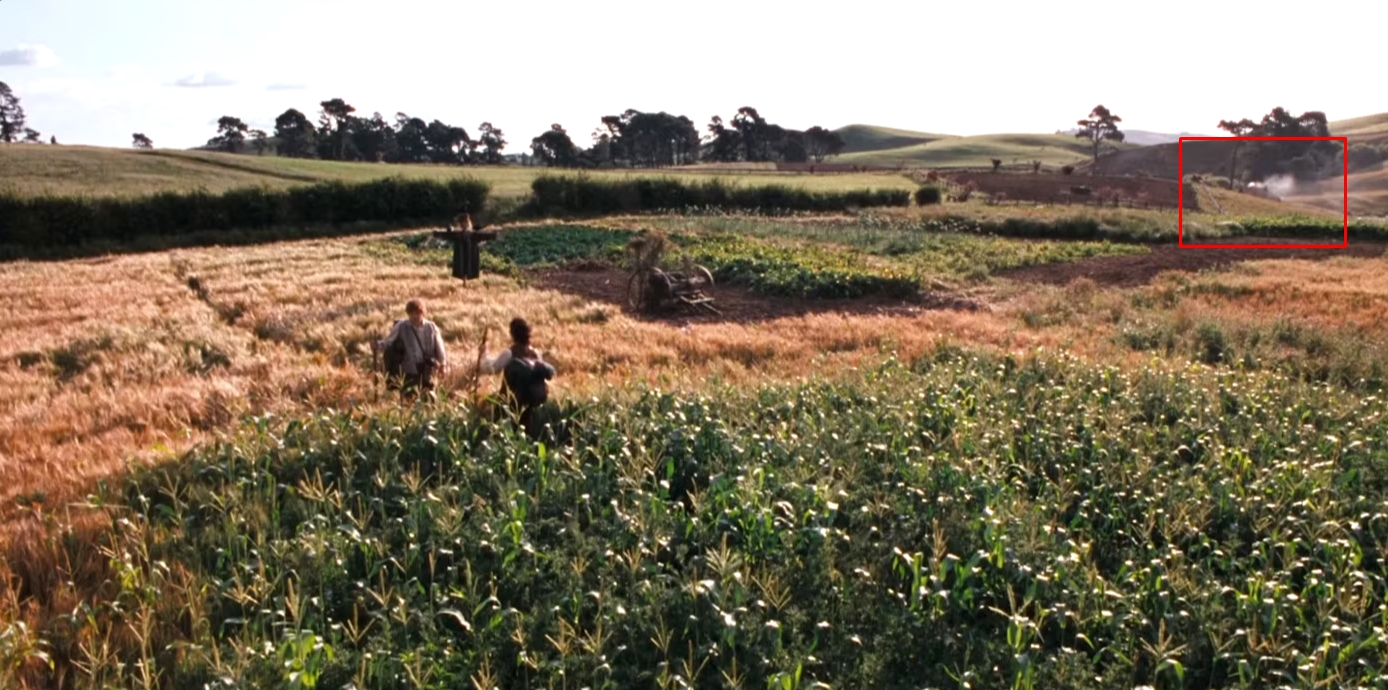 A modern car can be seen driving in the background of a shot in the Shire. in The Lord of the Rings: The Fellowship of the Ring