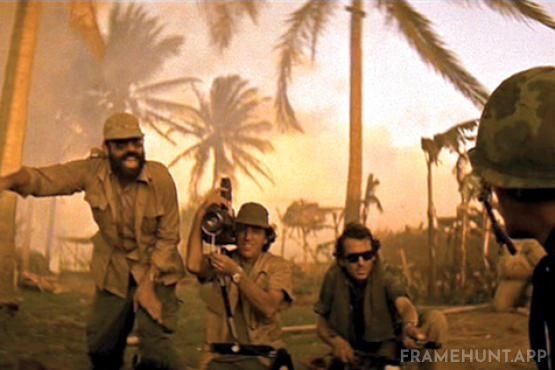 Director Francis Ford Coppola plays a TV news director telling the soldiers not to look at the camera. in Apocalypse Now