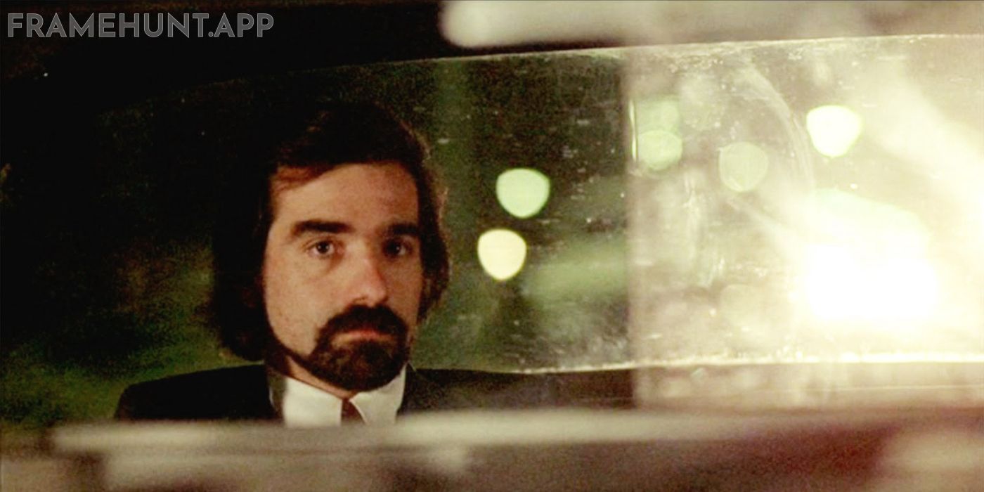 Director Martin Scorsese plays a disturbing passenger watching his cheating wife's apartment. in Taxi Driver
