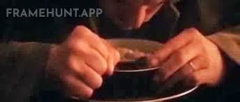 Cobb only wears his wedding ring when he is inside a dream, never in the real world. in Inception