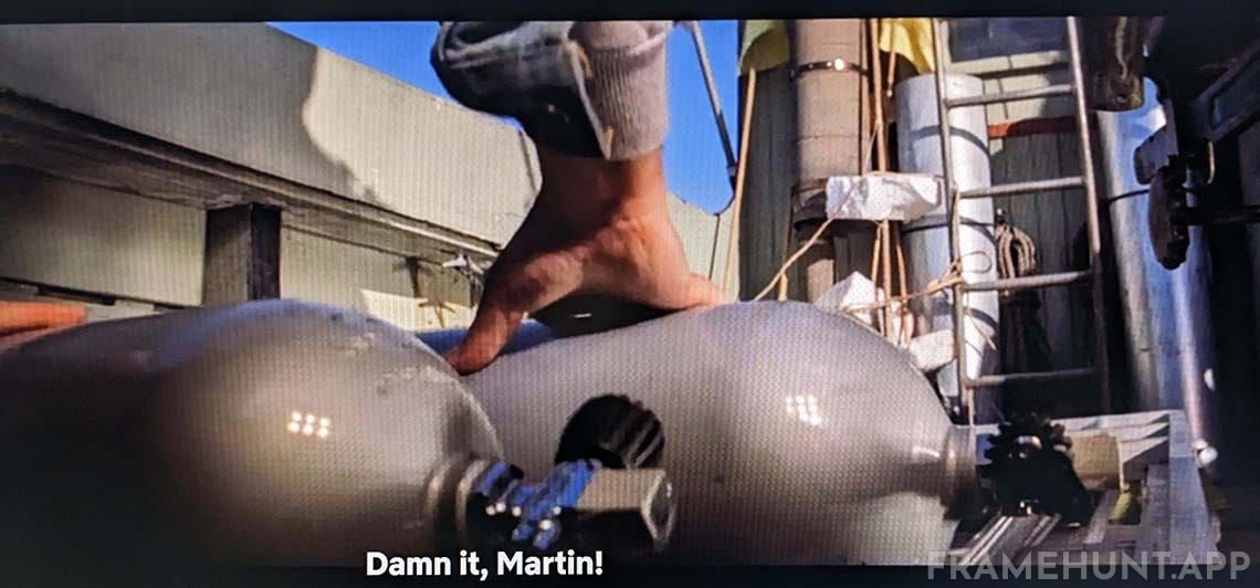 Chief Brody accidentally knocks over the oxygen tanks, leading to a warning that foreshadows the shark's death. in Jaws